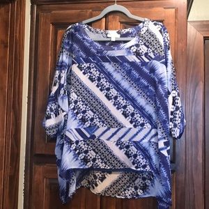 Blouse with camisole.  Sheer comfortable fabric.